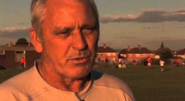 Grandfather &amp; Grandson Learning Football Skills